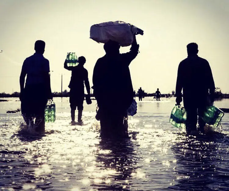 Families flee homes due to man made flood in Ahwaz